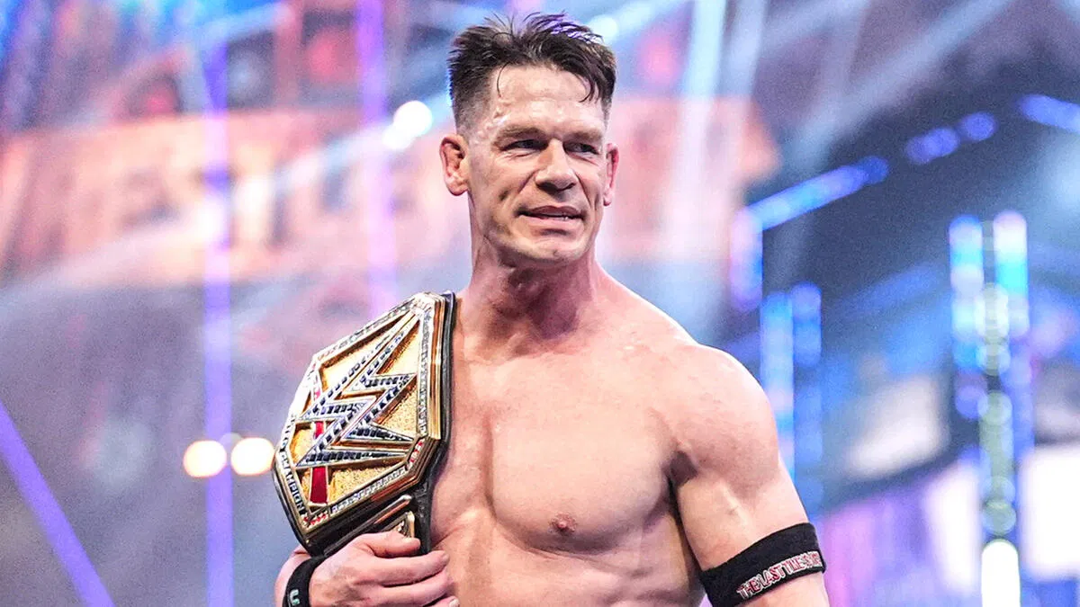 John Cena holding the Undisputed WWE Championship during his 2025 heel run