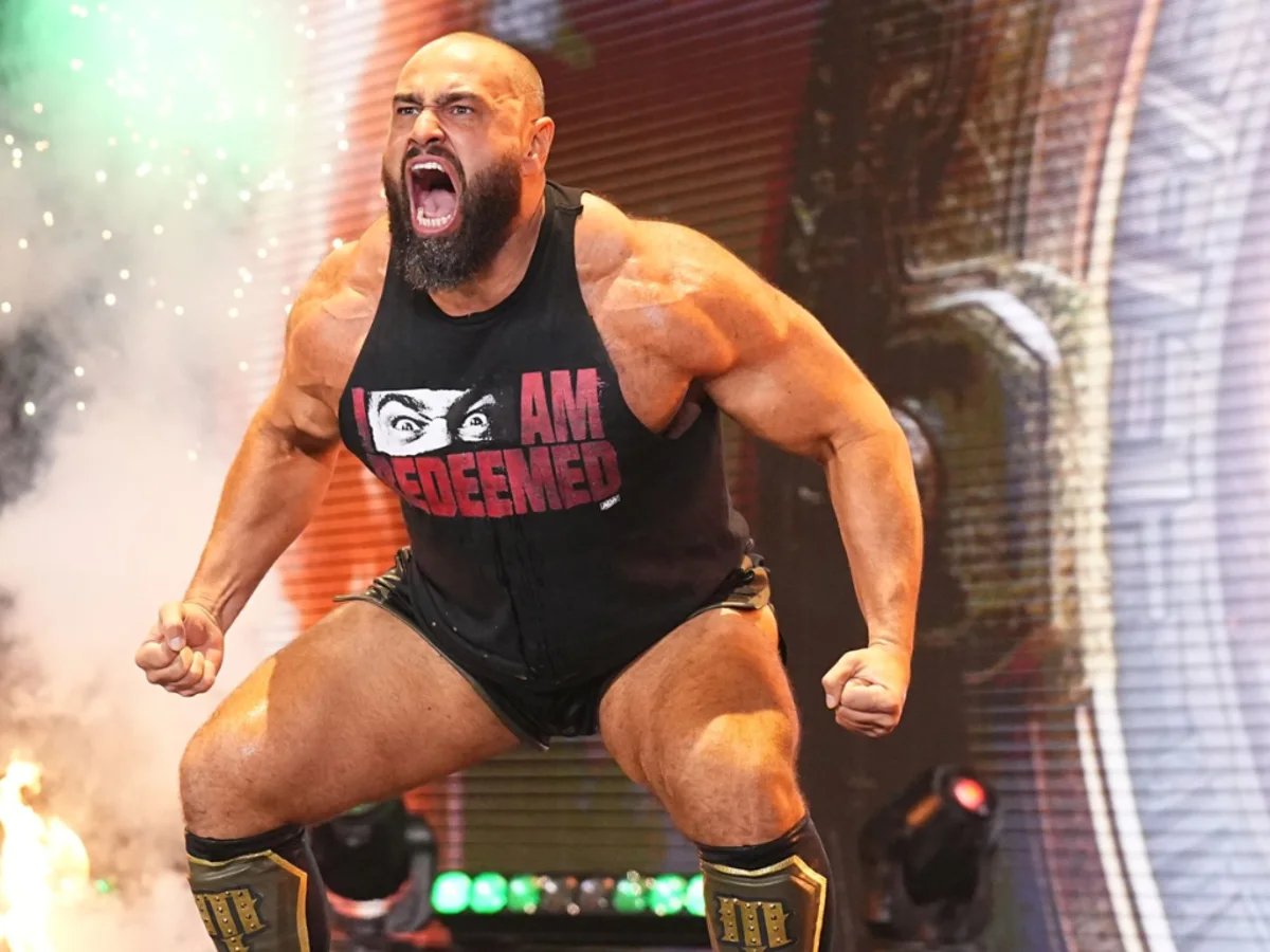Rusev makes an intense WWE entrance on SmackDown, showcasing his muscular build and aggressive demeanor.