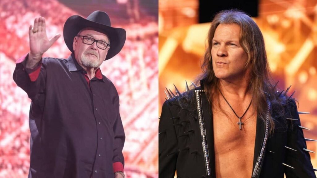 Professional wrestler Chris Jericho, with long hair and a purple sparkly jacket, smiles in a brightly lit arena.