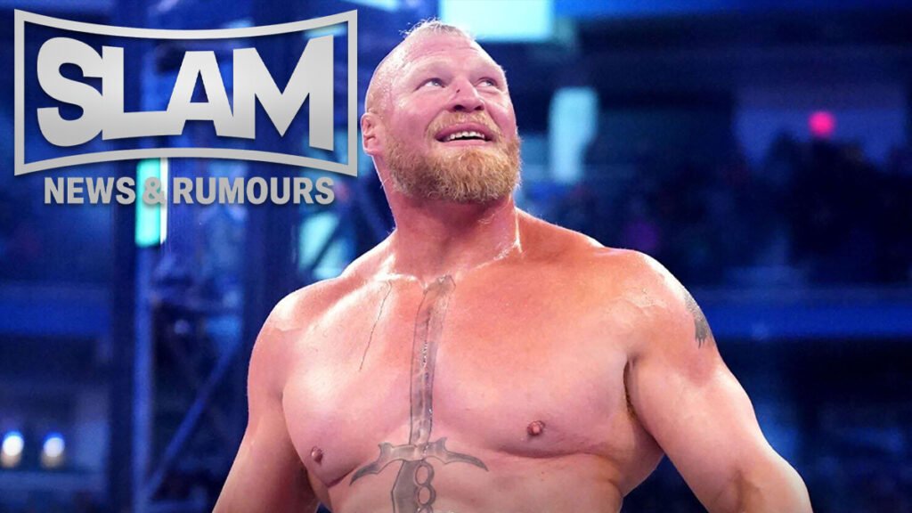 A medium shot of professional wrestler brock lesnar in a wrestling ring, shirtless and sweating, showing his distinctive sword tattoo on his chest. He has a short blonde buzz cut and a reddish beard, and he is looking upward with a slight smile. In the top left corner, a "slam news & rumours" logo is overlaid. - tjr wrestling