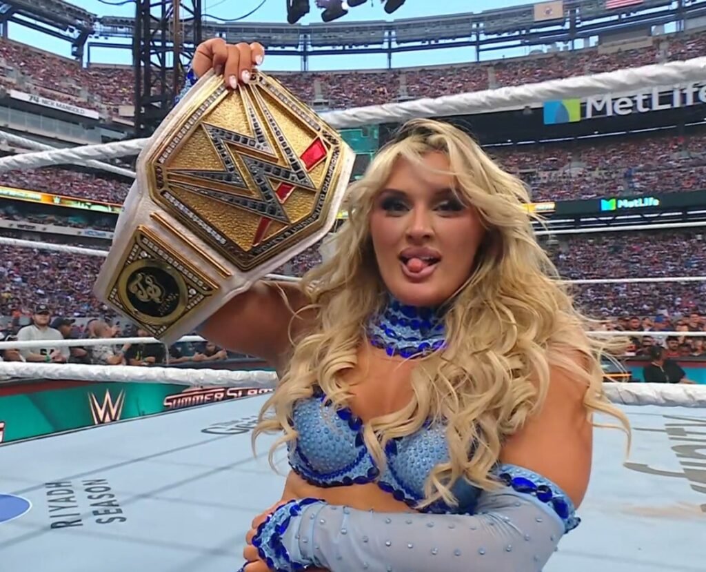 Tiffany stratton smiles during a wwe appearance while discussing her love for playstation 3 and call of duty zombies. - tjr wrestling