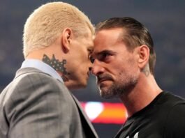 CM Punk, Cody Rhodes, and Danhausen celebrate together after a WWE live event, sharing a lighthearted moment before SummerSlam.