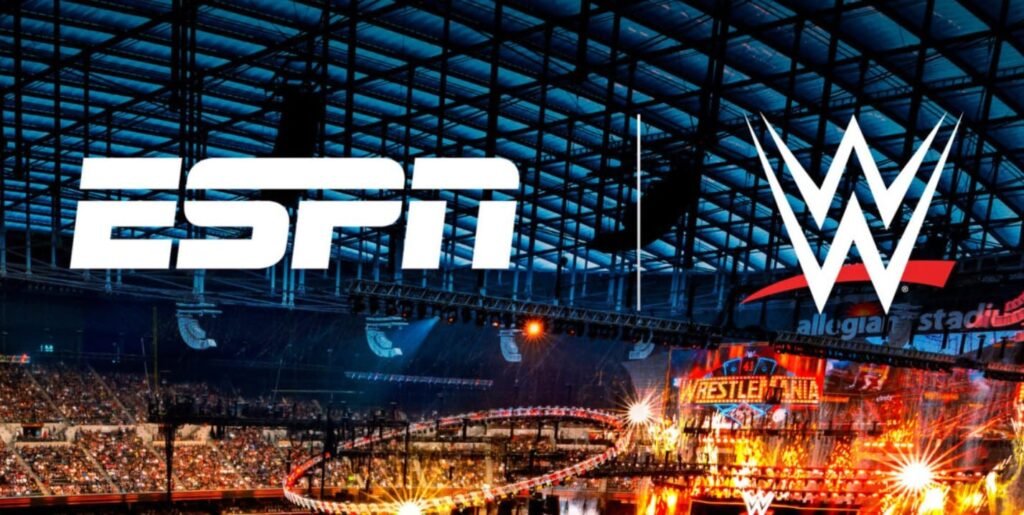Wwe and espn logos displayed over a packed wrestling stadium during a major wwe premium live event.