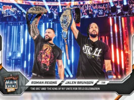Jalen Brunson and Roman Reigns pose together with WWE championship titles on a rare dual-autographed Topps trading card.